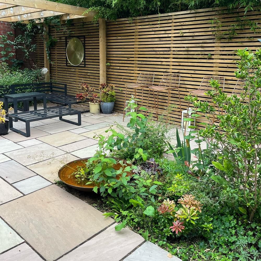 Classic Raj Imperial sandstone paving patio pack in a stylish back garden